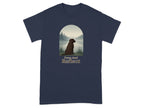 Chocolate lab sits by a lake with "Paws And Reflect" text.