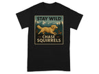 Black t-shirt with "Stay Wild Chase Squirrels" graphic of dog and squirrel.