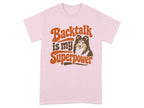Pink t-shirt with "Backtalk is my superpower" text and a dog.