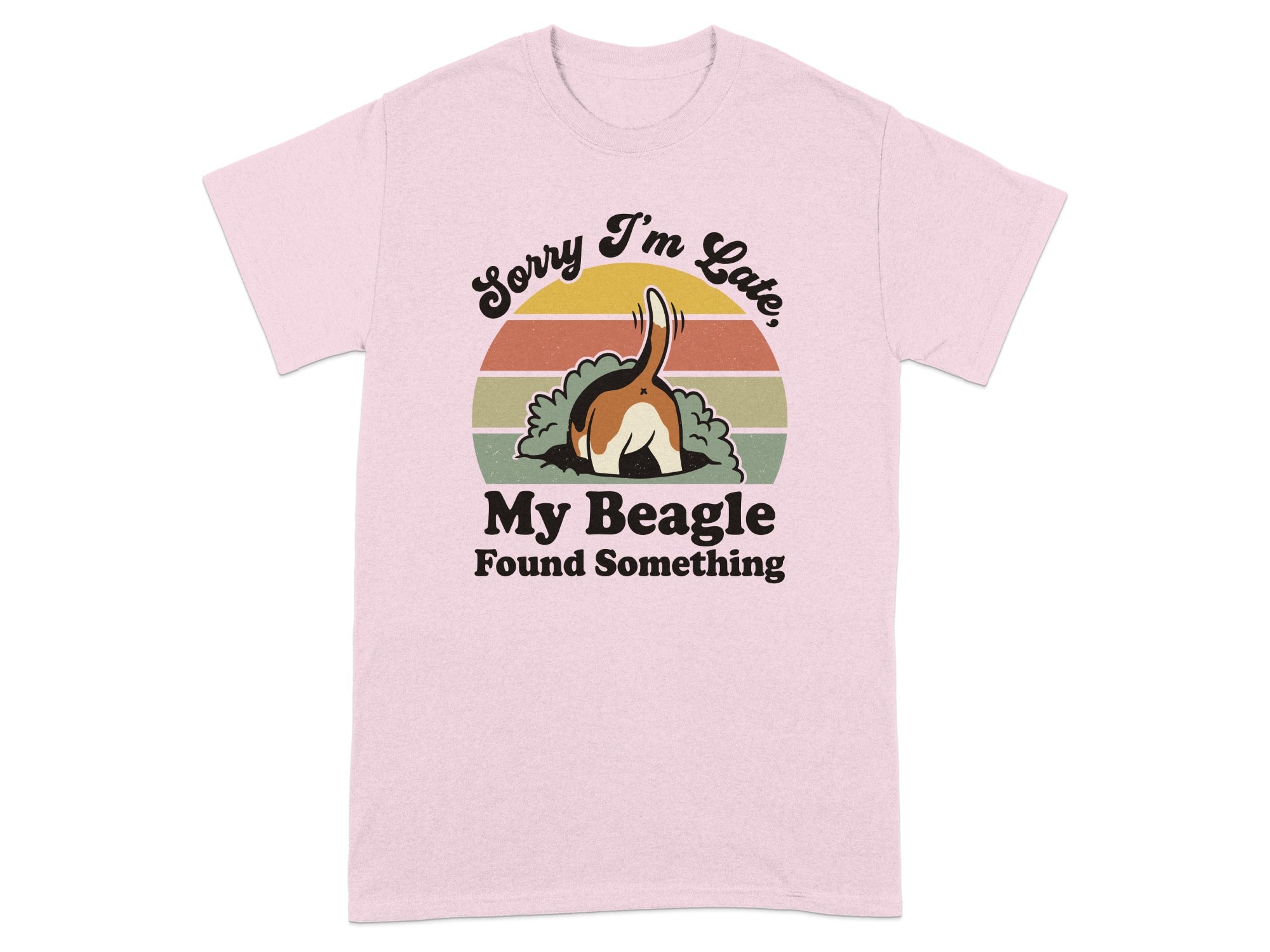 Pink t-shirt with text "Sorry I'm Late, My Beagle Found Something" and dog's hindquarters.