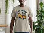 Tan t-shirt with a golden retriever graphic and "Trust the Nose" text.