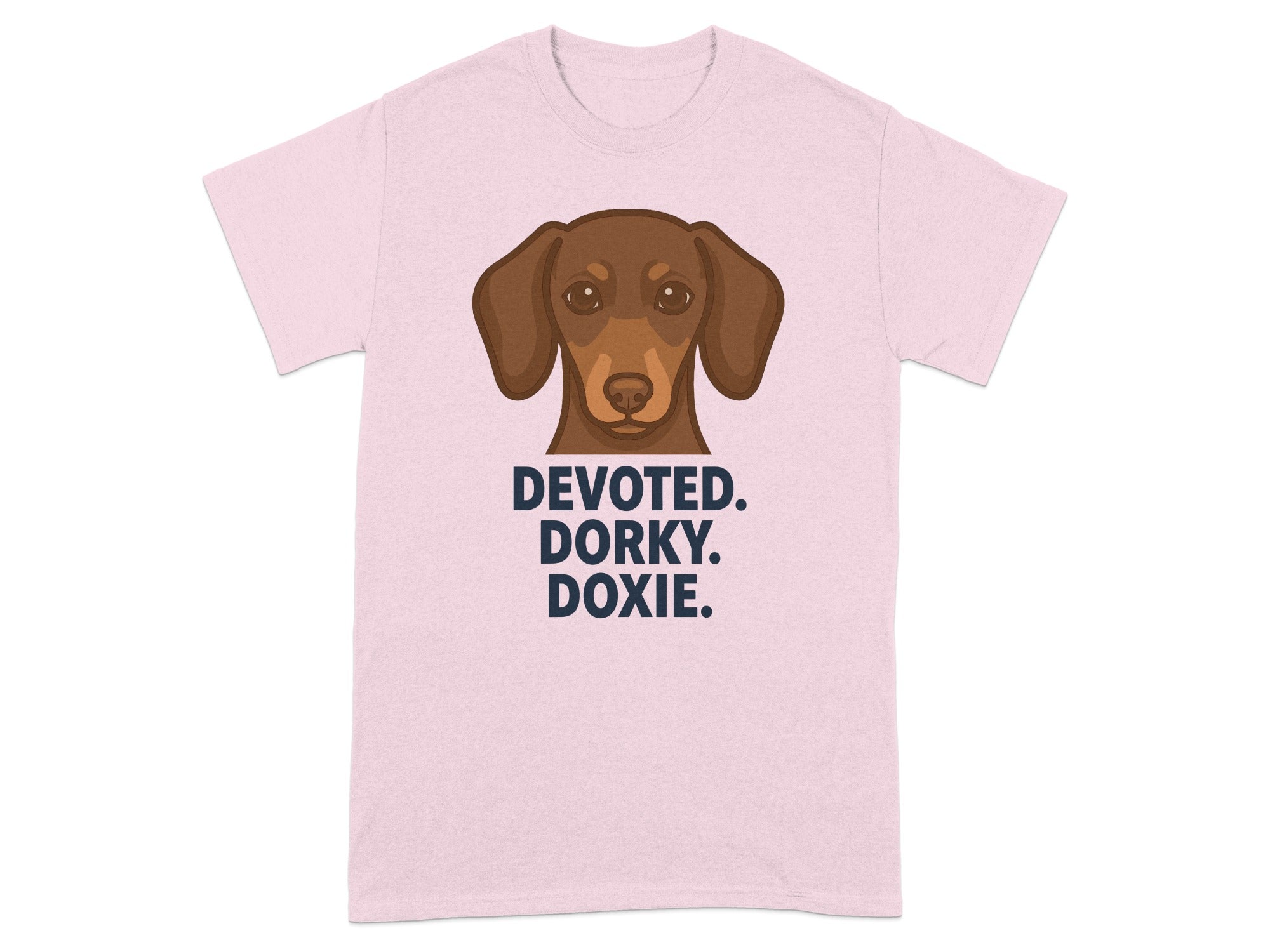 Pink t-shirt with a dachshund illustration and text "DEVOTED. DORKY. DOXIE."