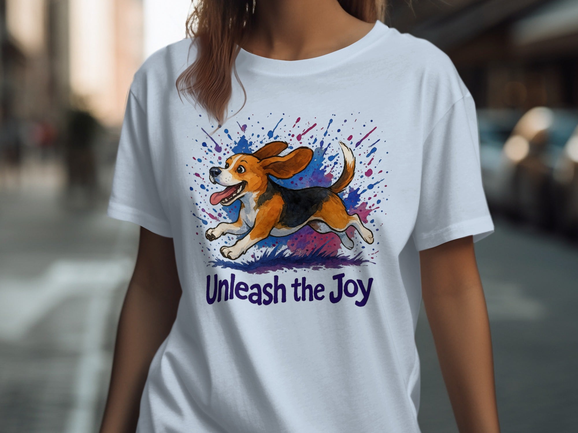 White t-shirt with watercolor beagle illustration and text "Unleash the Joy".