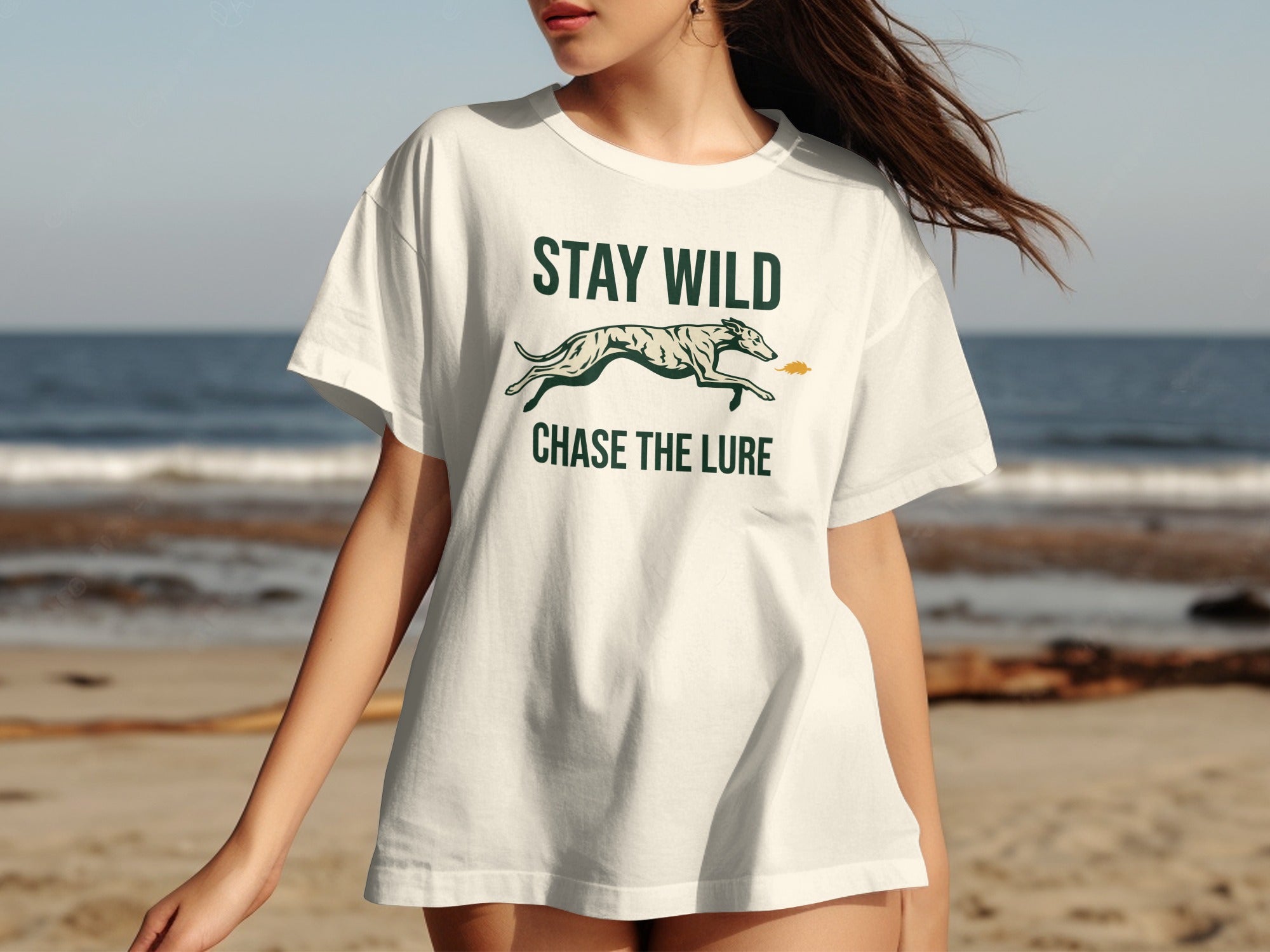 White t-shirt with "STAY WILD CHASE THE LURE" and dog silhouette.