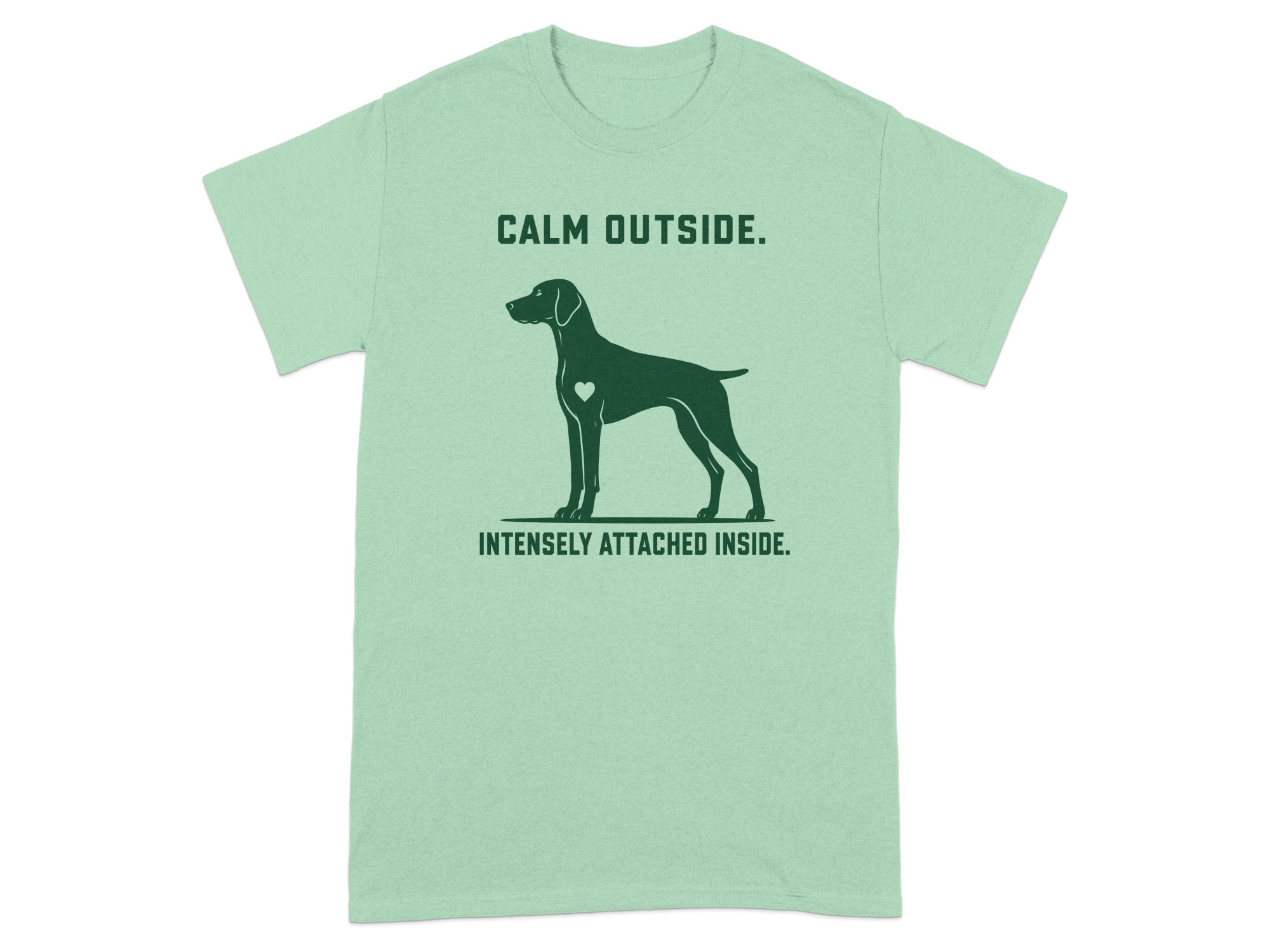 Green t-shirt with a dog silhouette and text "CALM OUTSIDE. INTENSELY ATTACHED INSIDE."