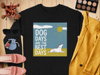 Black crewneck sweatshirt with "DOG DAYS ARE THE BEST DAYS" text and a dog under the sun.