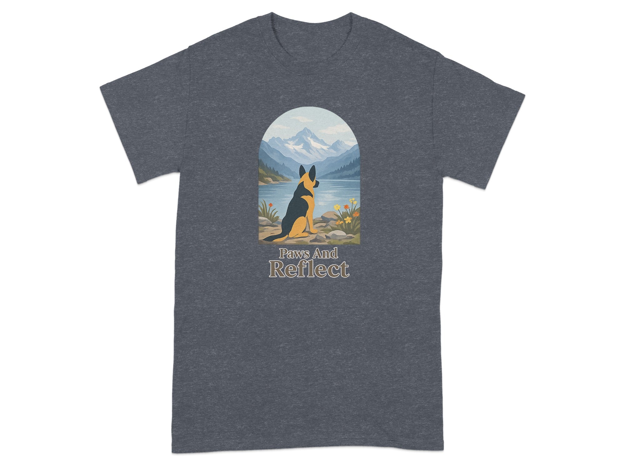 German Shepherd sits by a lake with mountains, with text "Paws And Reflect".