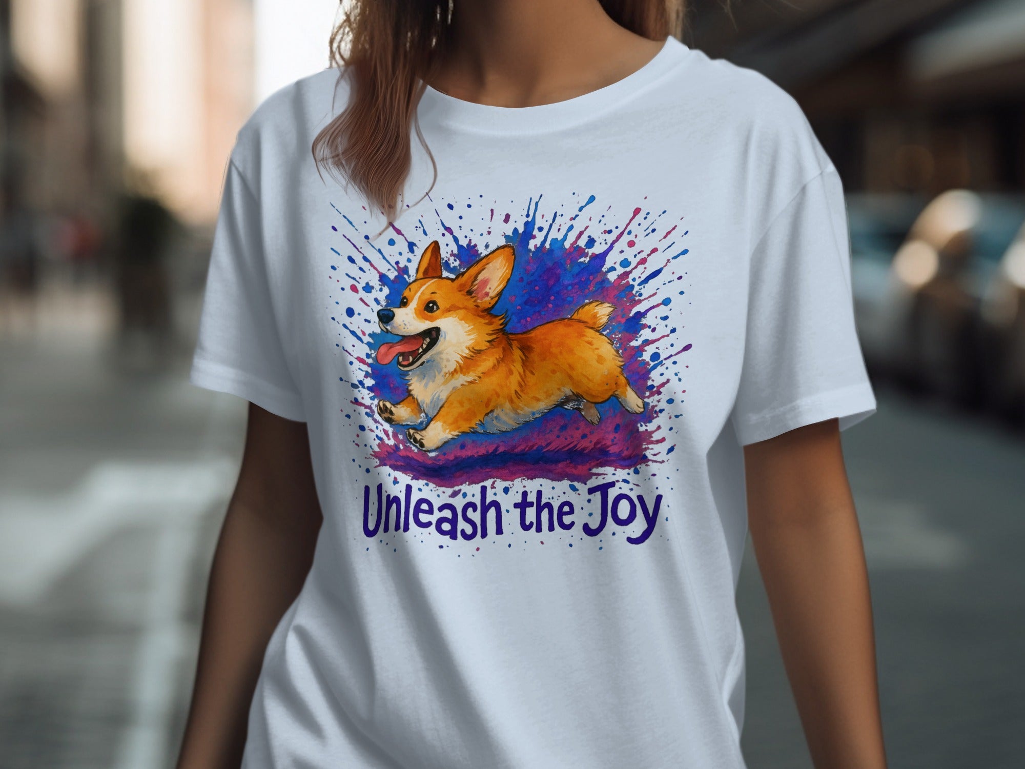 White t-shirt with watercolor corgi and text "Unleash the Joy"