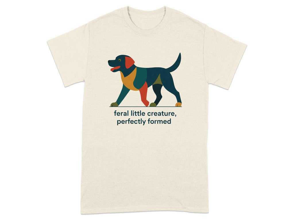 Cream t-shirt with a geometric dog graphic and text "feral little creature, perfectly formed".