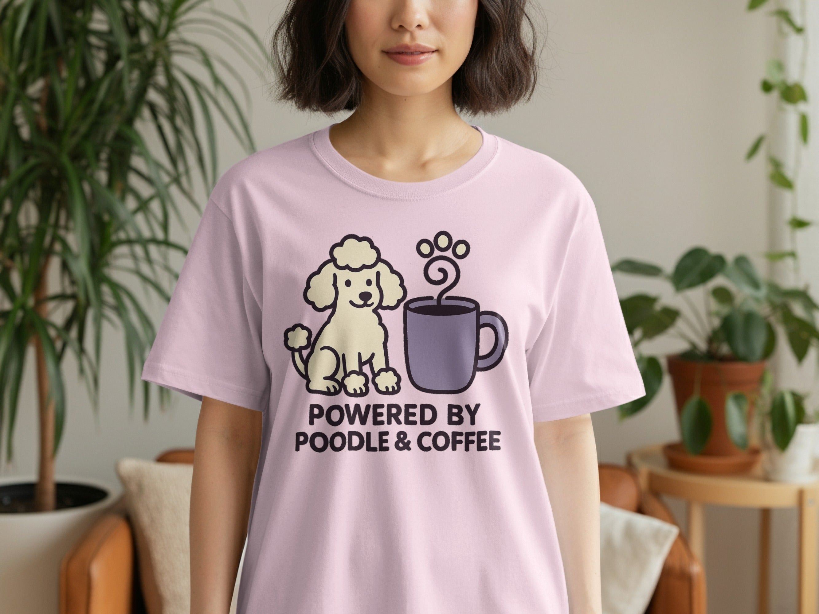 Pink t-shirt with cartoon poodle and coffee mug, reading "Powered by Poodle & Coffee".