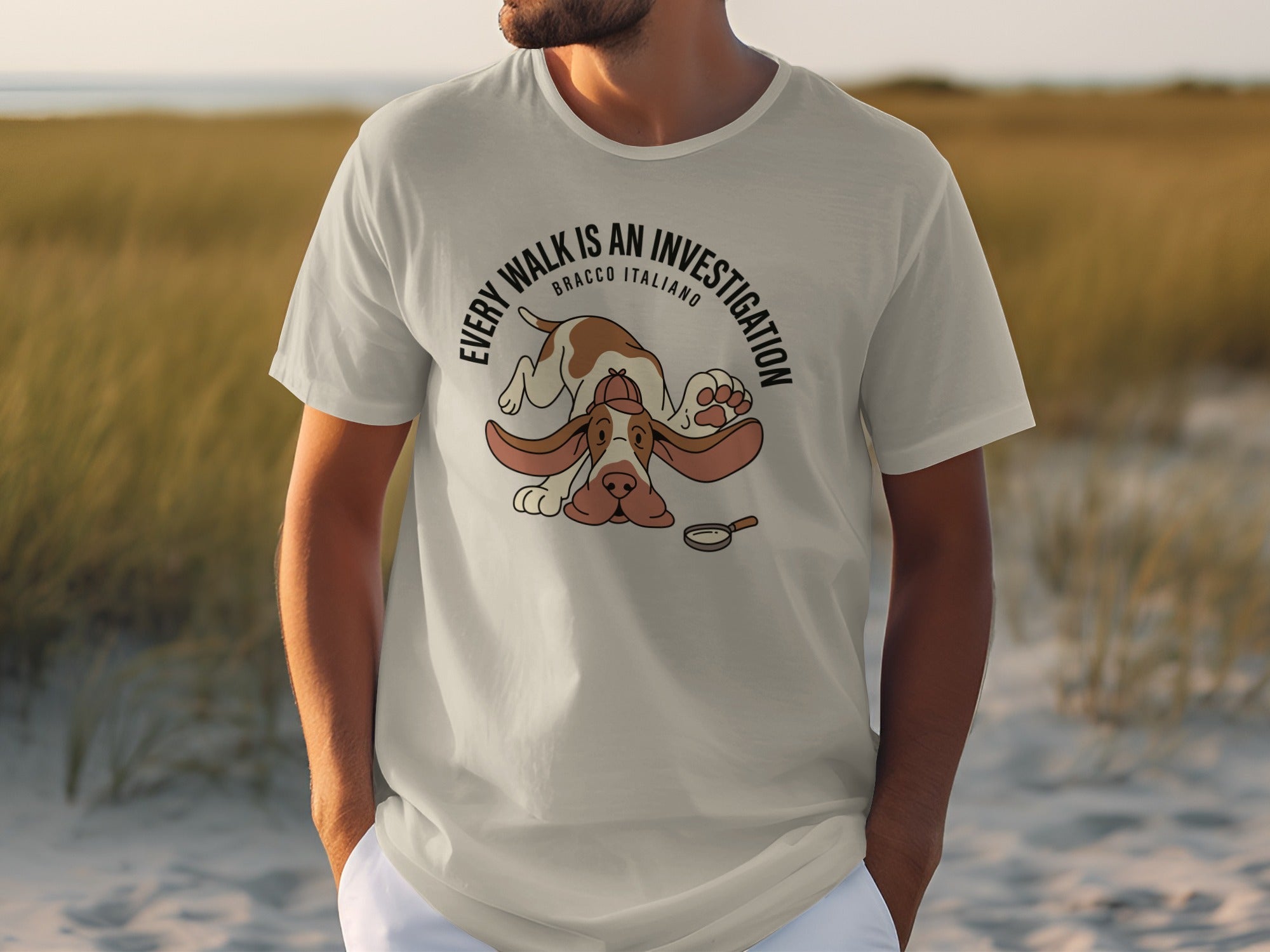 T-shirt with a cartoon Bracco Italiano dog, magnifying glass, and text "Every Walk is an Investigation".