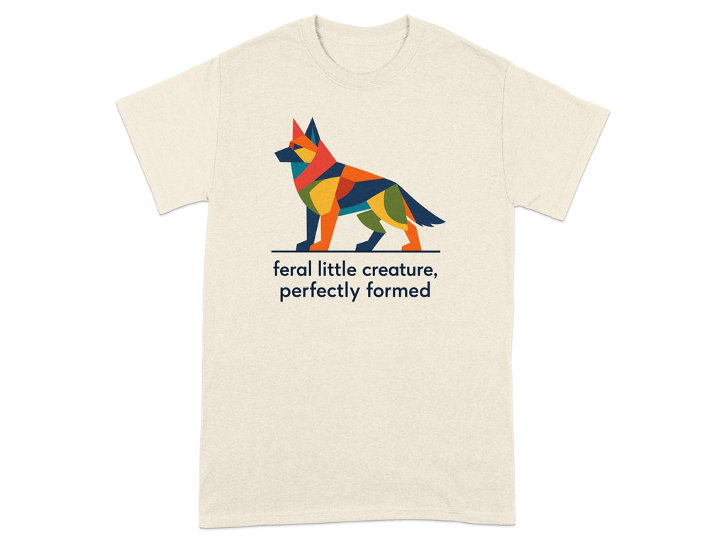 Geometric dog design on a cream t-shirt with text "feral little creature, perfectly formed".