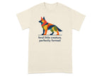 Geometric dog design on a cream t-shirt with text "feral little creature, perfectly formed".
