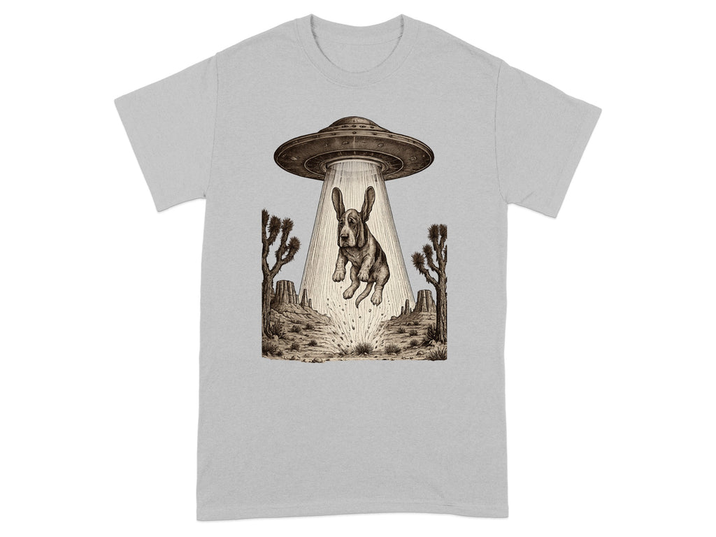 Basset hound UFO abduction scene in desert landscape with cacti and mesas.