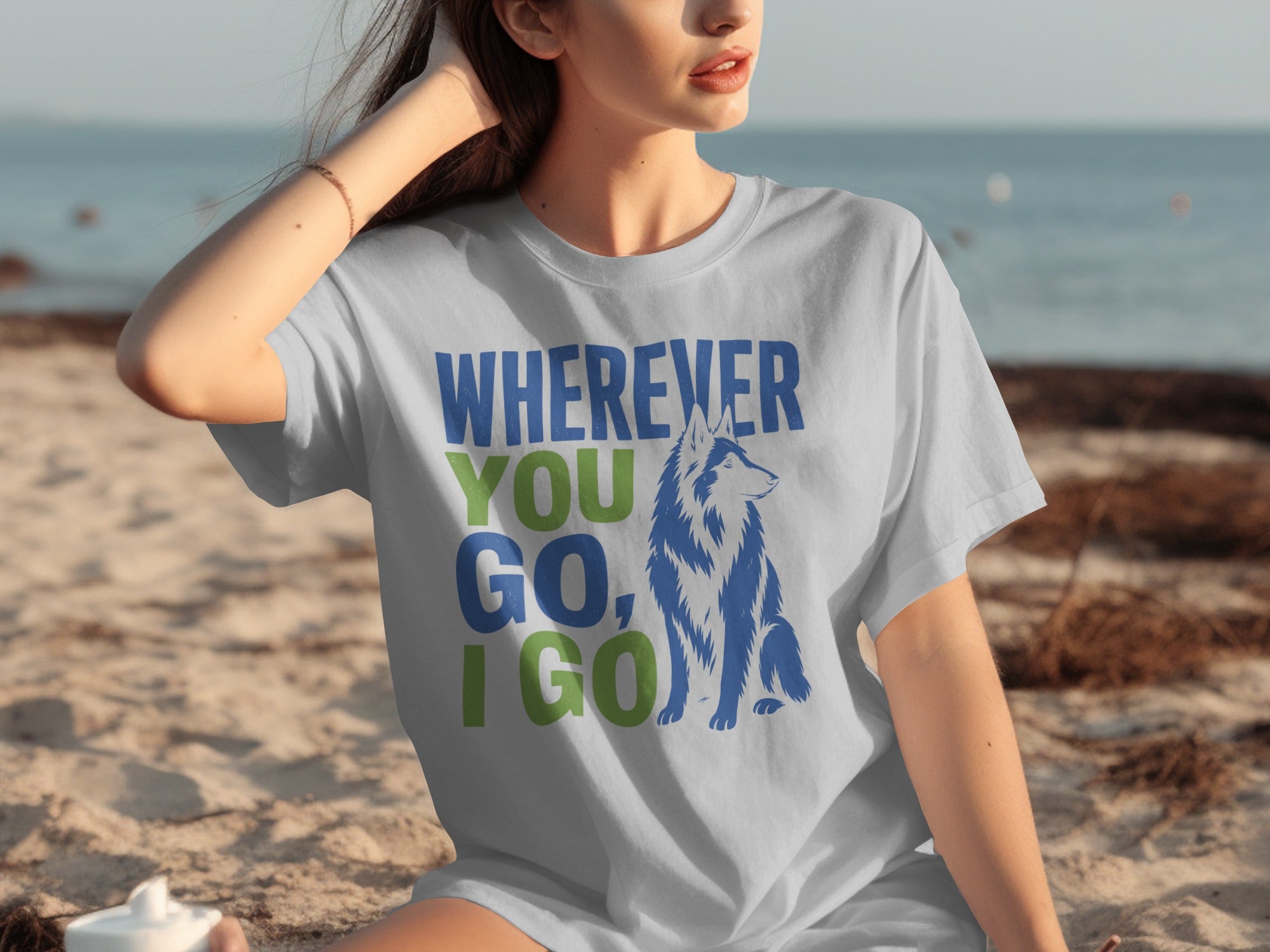 Light grey t-shirt with a wolf and text "Wherever You Go, I Go."