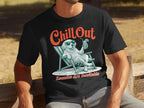 Black t-shirt with a relaxed dog in a deck chair, wearing sunglasses and holding a drink.