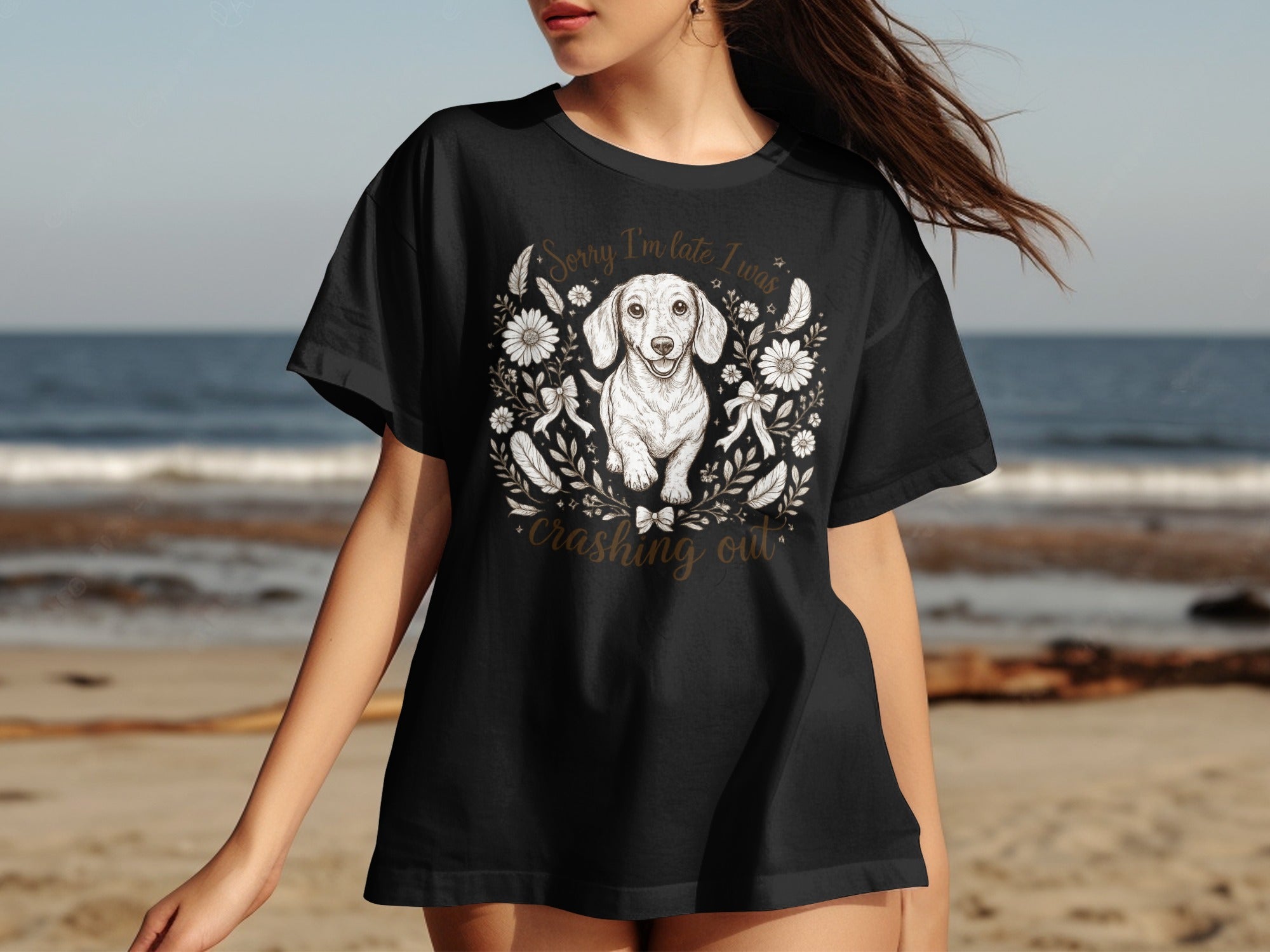 Black t-shirt with a dachshund illustration and text "Sorry I'm late I was crashing out".