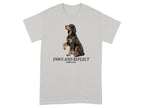 Gordon Setter on a light gray t-shirt with "Paws and Reflect" text.