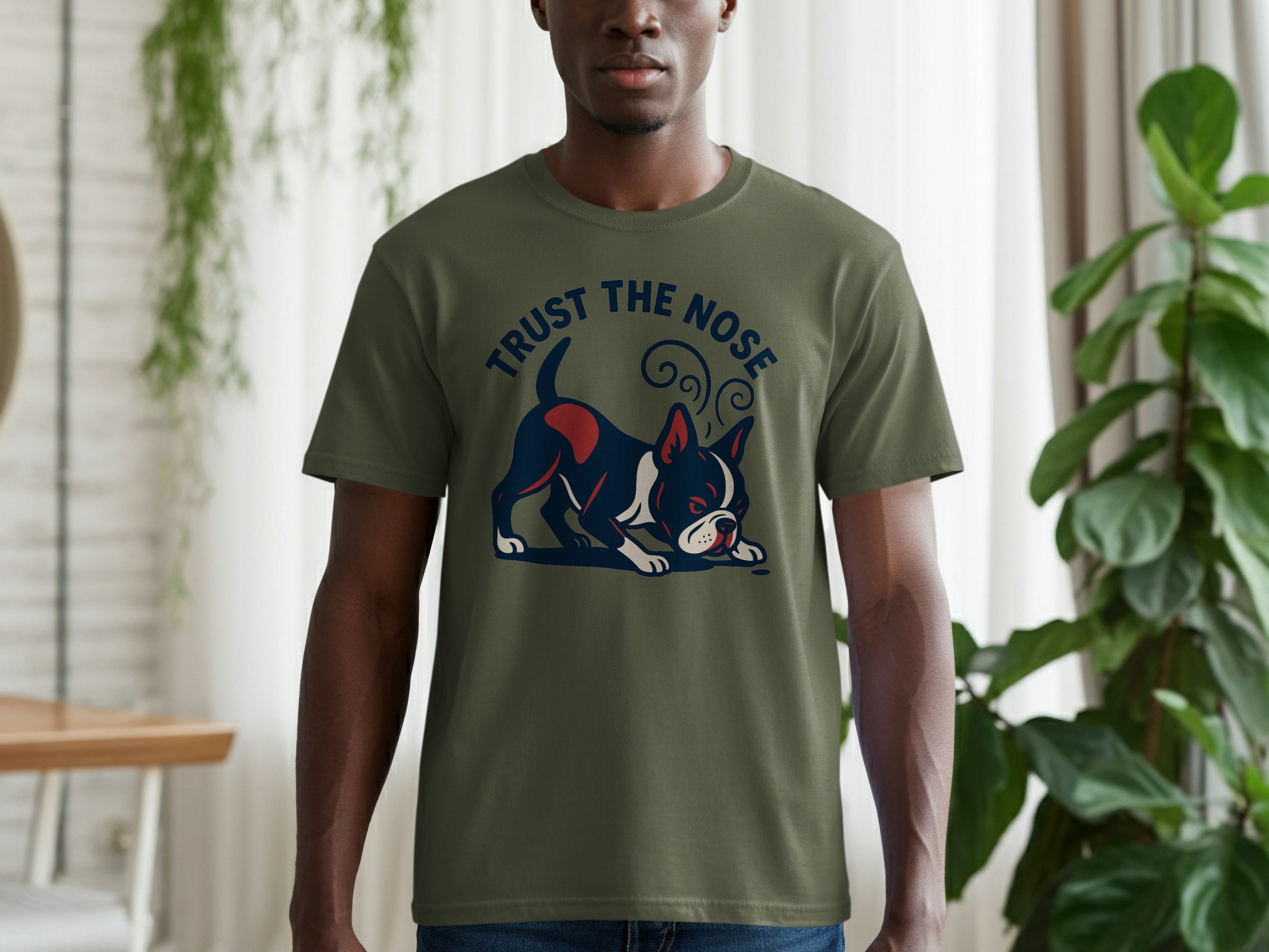 Green t-shirt with a graphic of a Boston terrier and the text "TRUST THE NOSE".