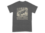 Dark grey t-shirt with a beagle in a detective hat sniffing the ground.