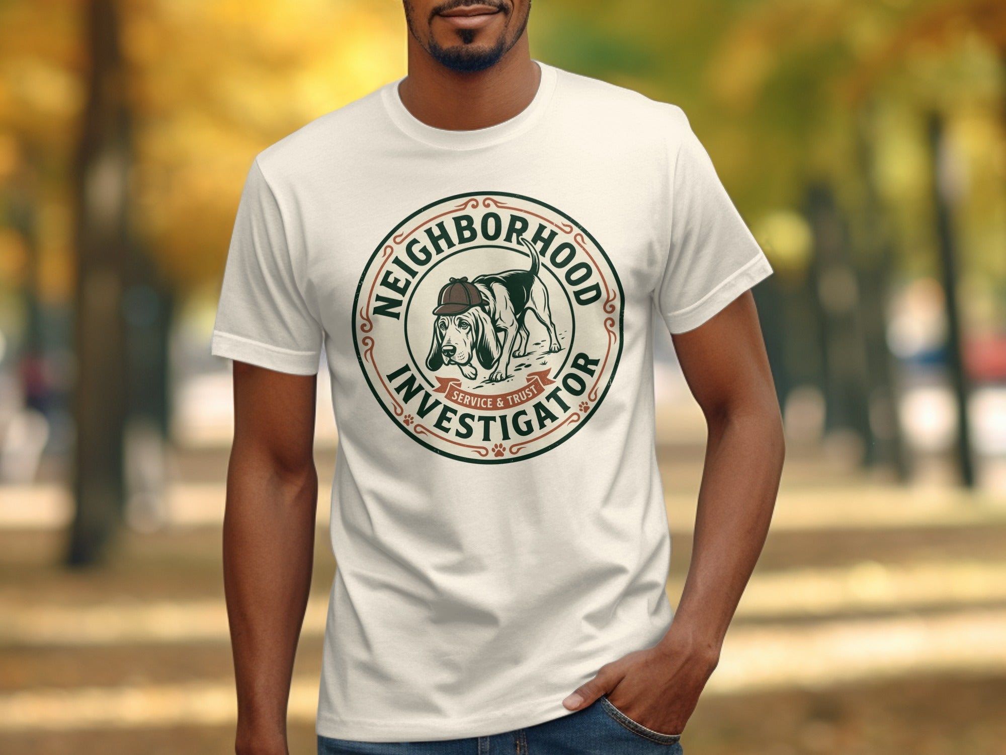 White t-shirt with "Neighborhood Investigator" logo featuring a dog.