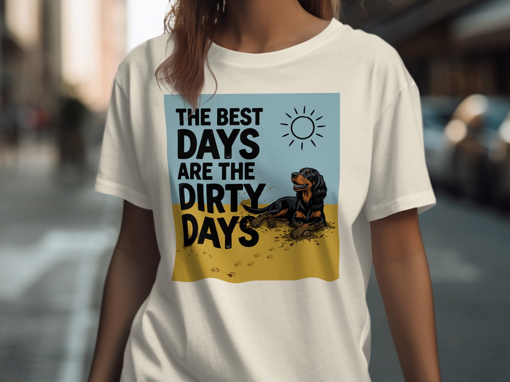 T-shirt with "The best days are the dirty days" text and a sun and dog graphic.