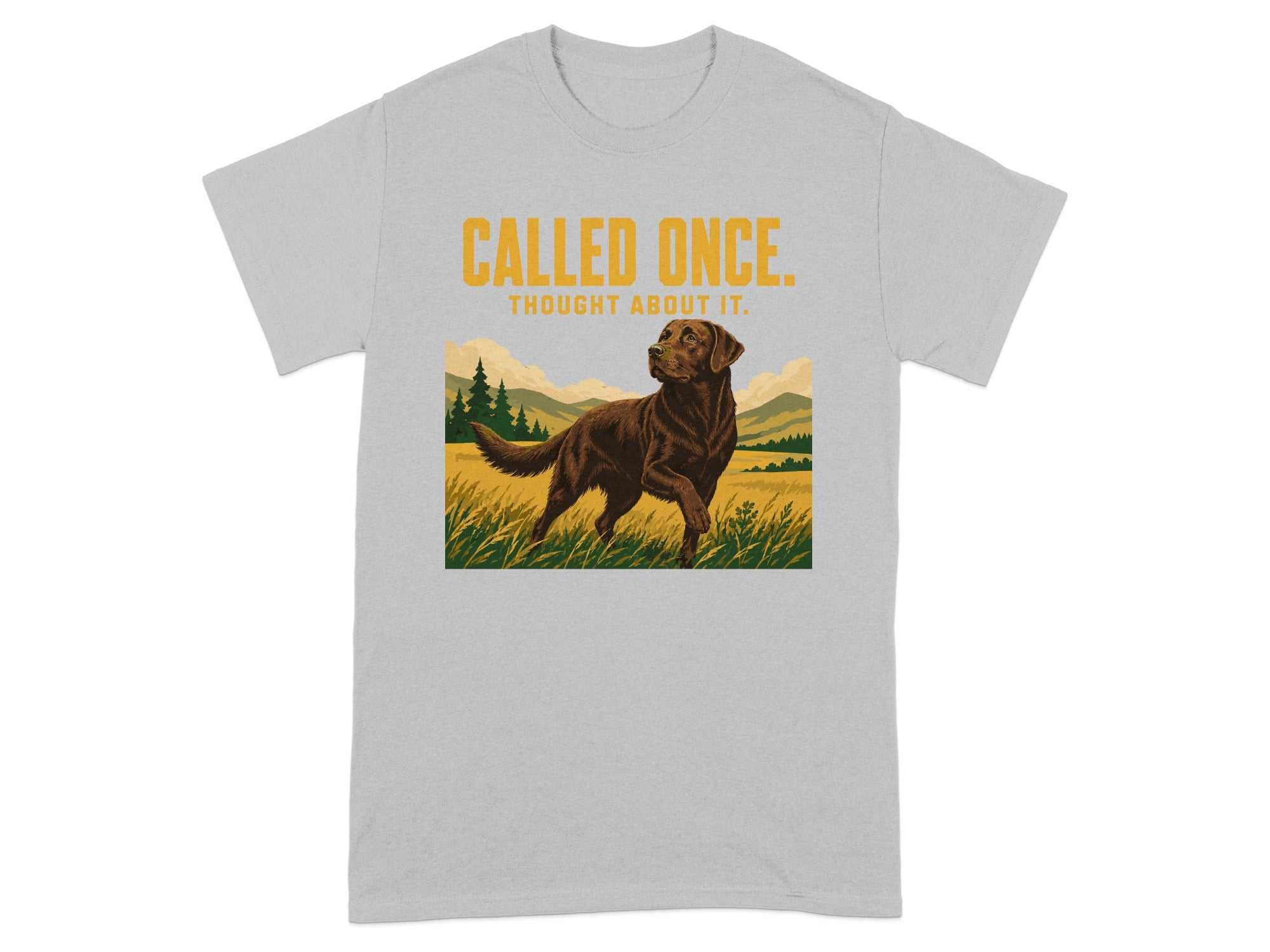 Brown dog in field with "CALLED ONCE. THOUGHT ABOUT IT." text on t-shirt.
