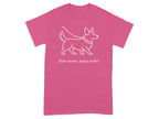 Pink t-shirt with white line drawing of a corgi and text "Slow down, enjoy walks".
