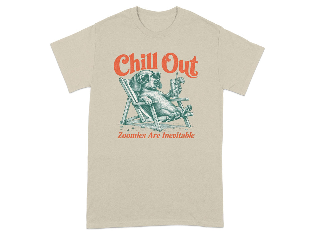 T-shirt with a dog wearing sunglasses relaxing in a chair, "Chill Out" and "Zoomies Are Inevitable" text.