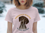 Pink t-shirt with "Personally Invested in Your Business" and a German Shorthaired Pointer dog.