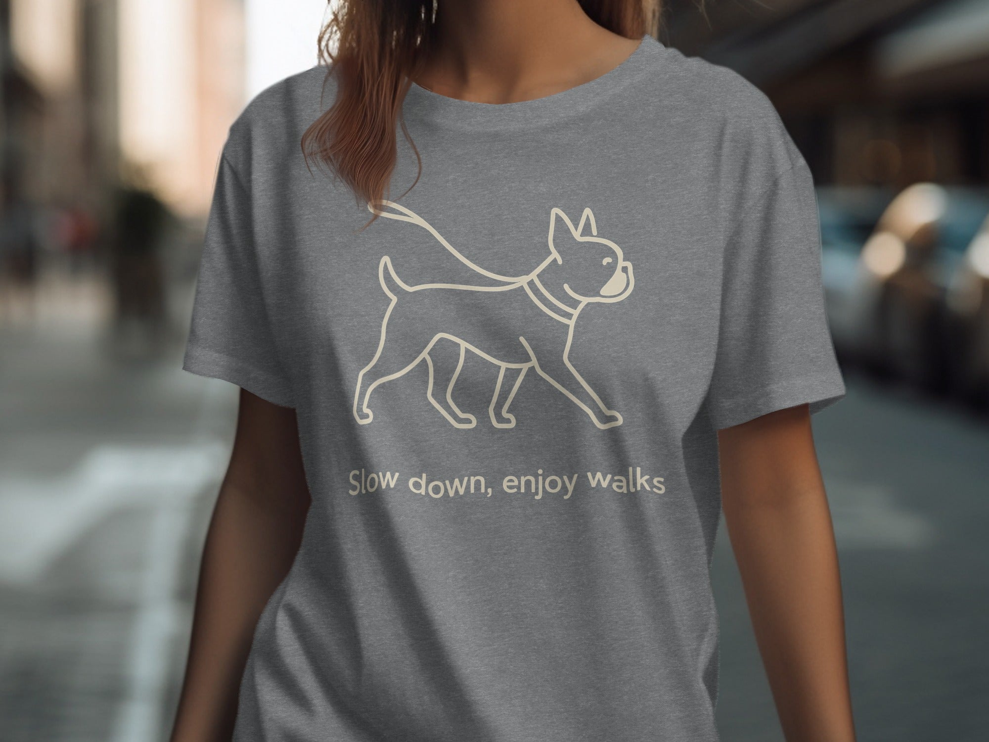 Grey t-shirt with a line drawing of a French bulldog and text "Slow down, enjoy walks."
