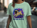 Light mint t-shirt with a pug illustration and "Unleash the Joy" text.