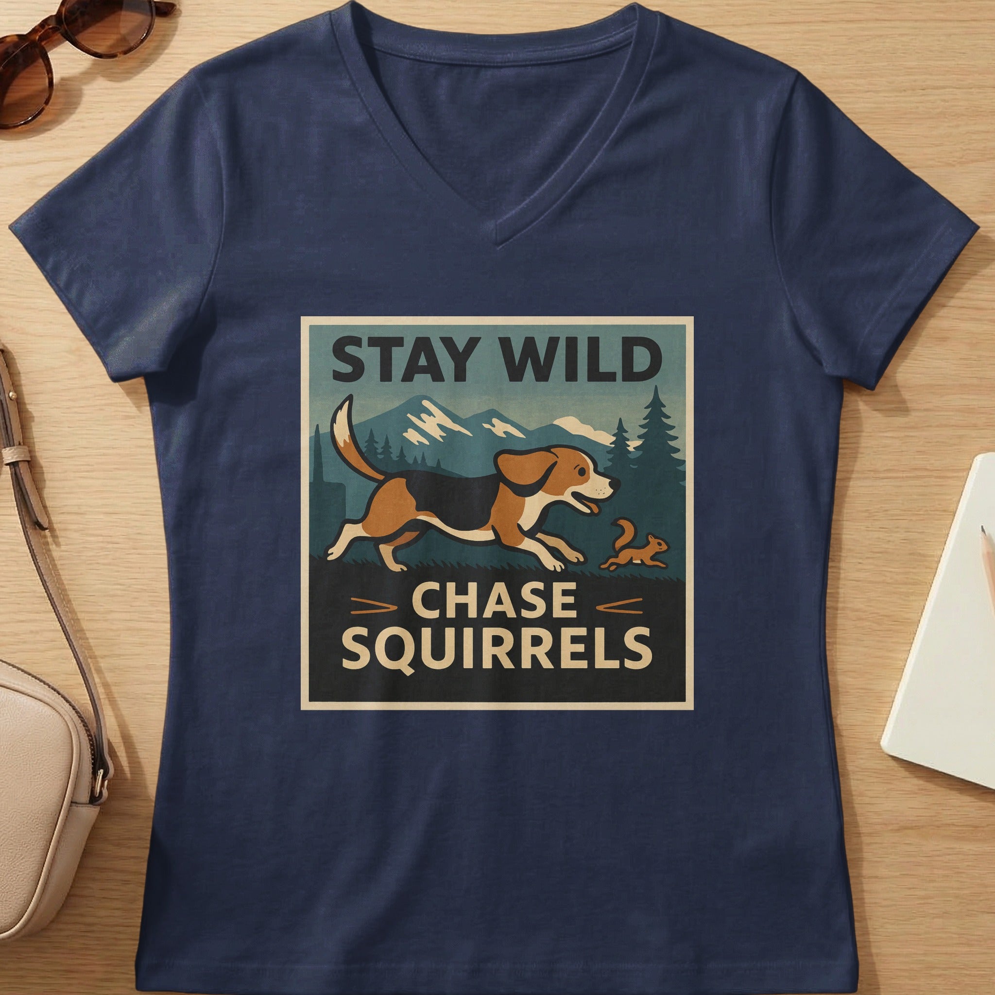 Navy t-shirt with "Stay Wild Chase Squirrels" graphic featuring a dog and squirrel.
