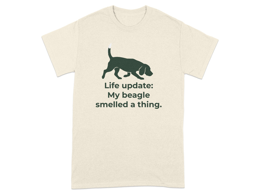 Beagle silhouette on cream t-shirt with text "Life update: My beagle smelled a thing."