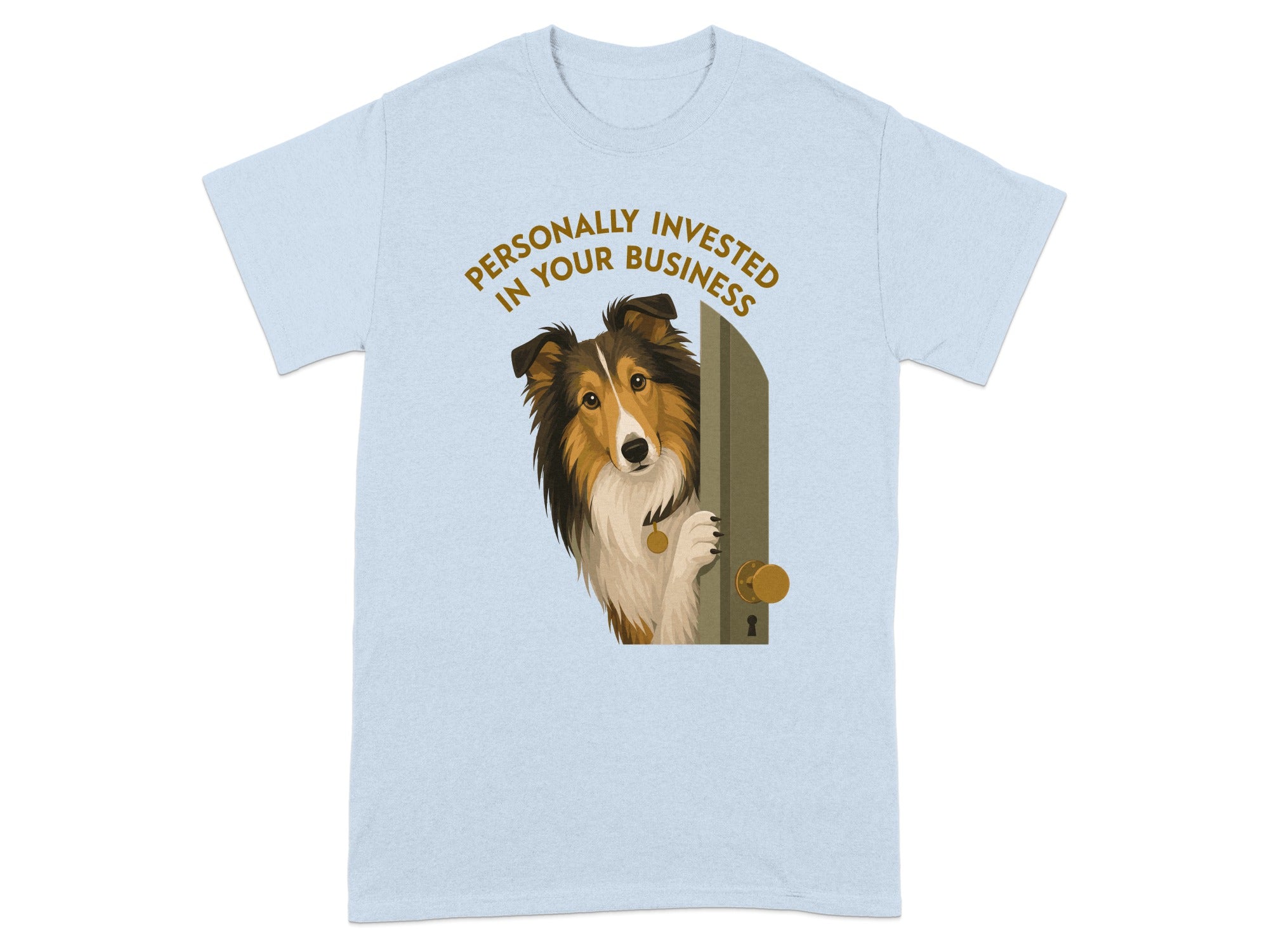 Collie peeking through an open door, wearing a pendant, on a light blue t-shirt.