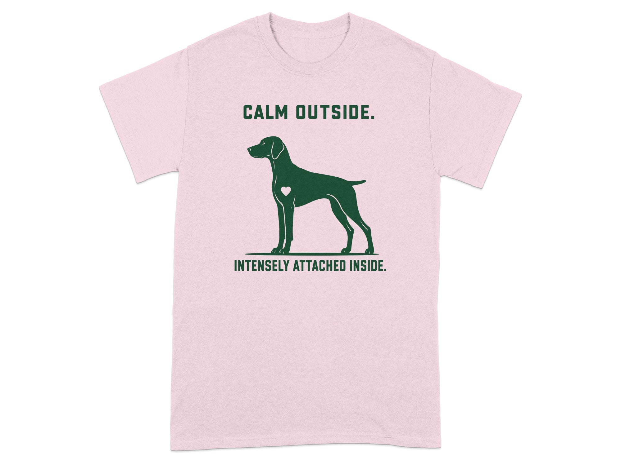 Pink t-shirt with dog silhouette and text "CALM OUTSIDE. INTENSELY ATTACHED INSIDE."