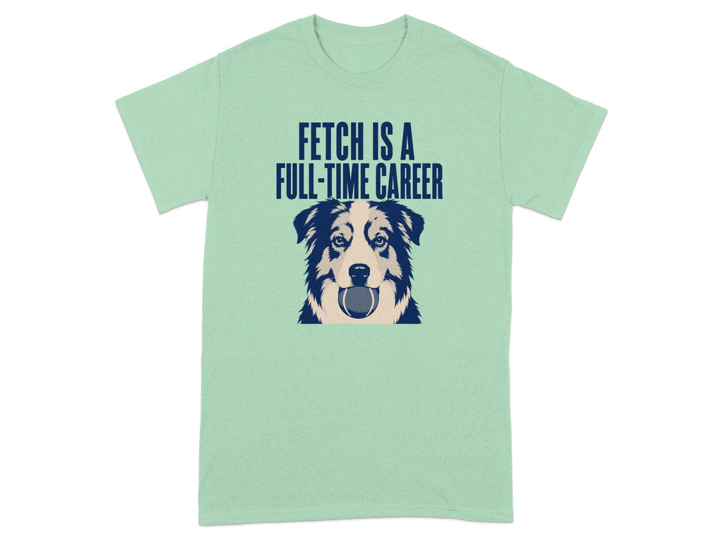 Mint green t-shirt with a dog holding a ball and text "FETCH IS A FULL-TIME CAREER".