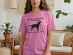 Pink t-shirt with a black dog silhouette and text: Personally Victimized by Barking at Absolutely Nothing.