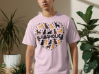 Pink t-shirt with a heart made of various Labrador dog silhouettes and the text "LABAHOLIC".