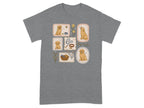 T-shirt with illustrations of golden retrievers in decorative frames and a basket of toys.
