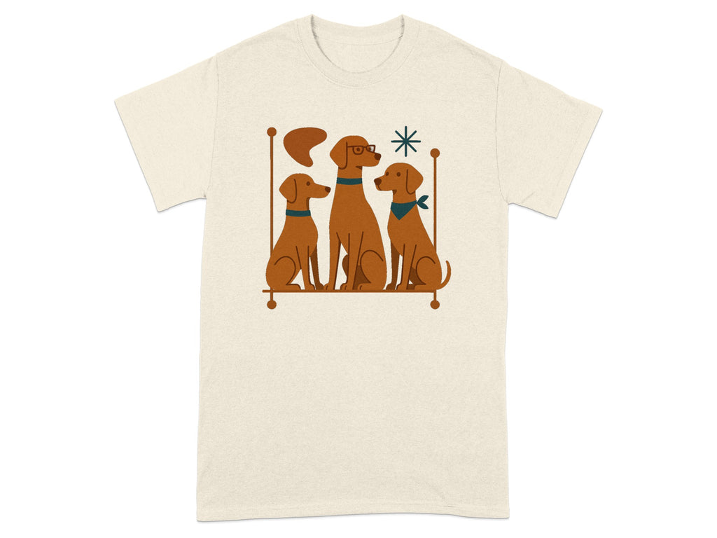 Three brown dogs sit next to each other, one wearing glasses, on a beige t-shirt.