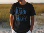 Black t-shirt with a dog graphic and text "I DON'T BARK. I DEBATE."