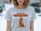 T-shirt with stylized dog and text "Somebody Must Maintain Order".