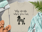 Crewneck sweatshirt with "Why doodle when you can Poodle" text and poodle silhouette.