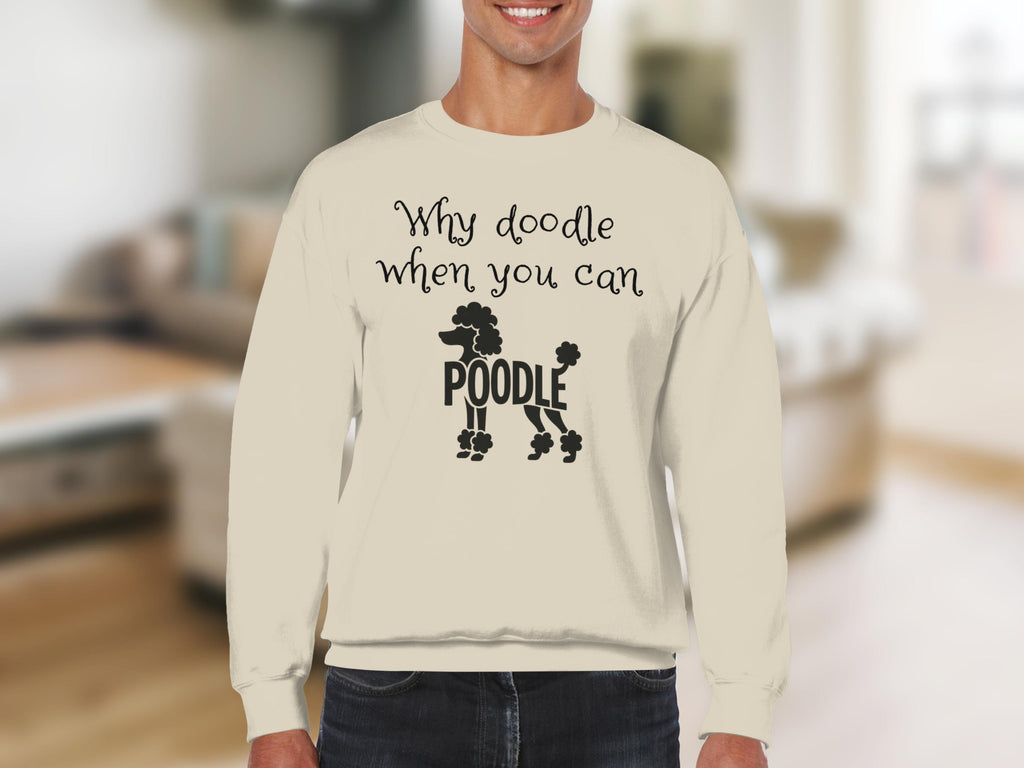 Cream sweatshirt with "Why doodle when you can poodle" text and poodle graphic.