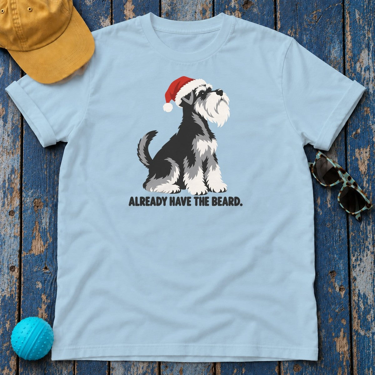 Already Have the Beard Sitting Santa Schnauzer T-Shirt in Light Blue - flat lay