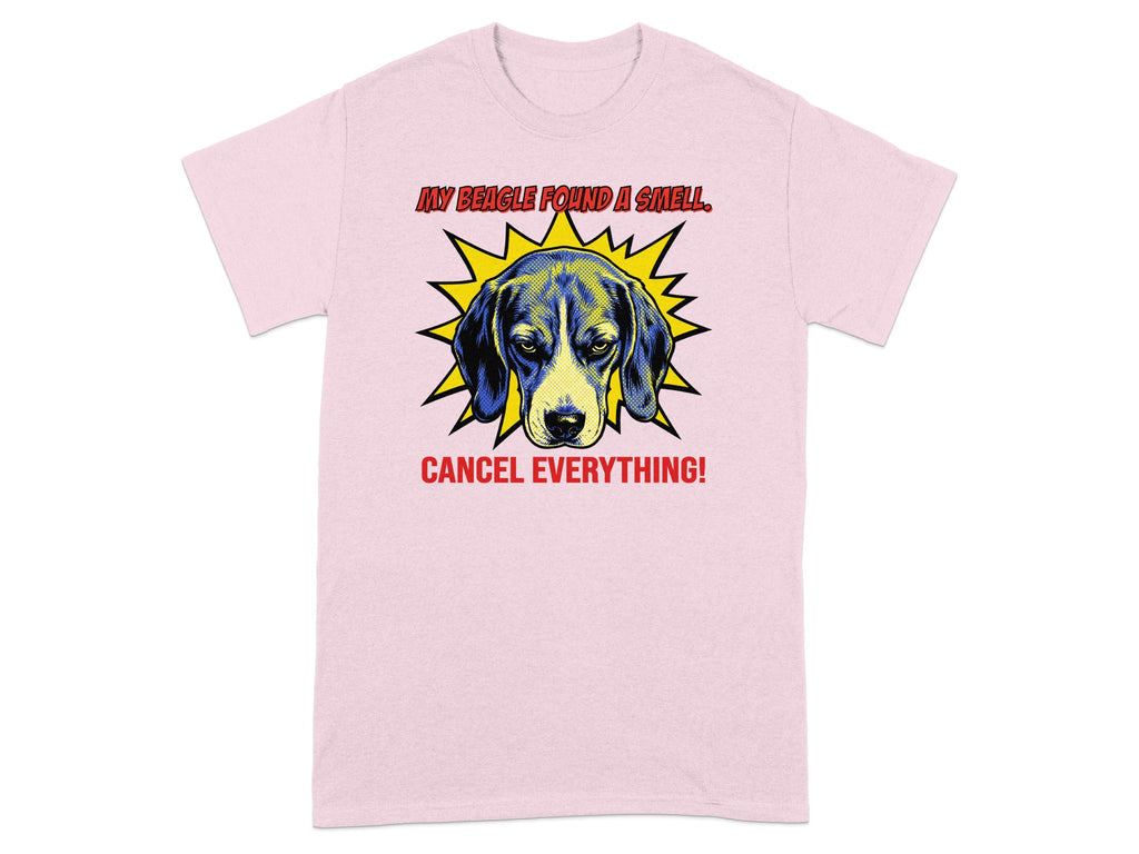 Pink t-shirt with a comic-style beagle illustration and text.