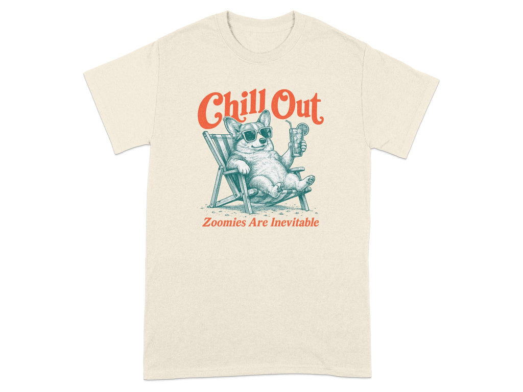 Cream t-shirt with a corgi relaxing in a beach chair, holding a drink, with text "Chill Out".