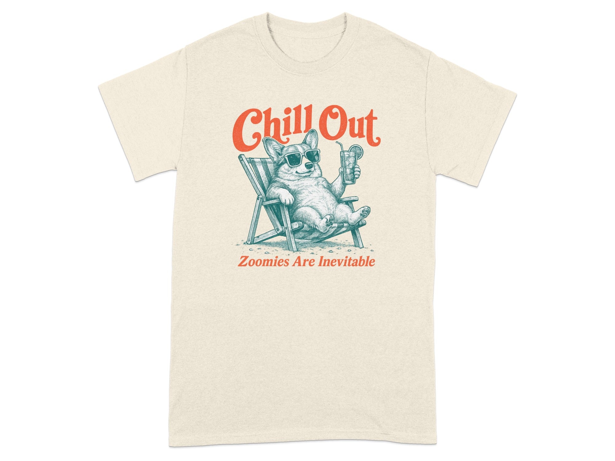 Cream t-shirt with a corgi relaxing in a beach chair, holding a drink, with text "Chill Out".