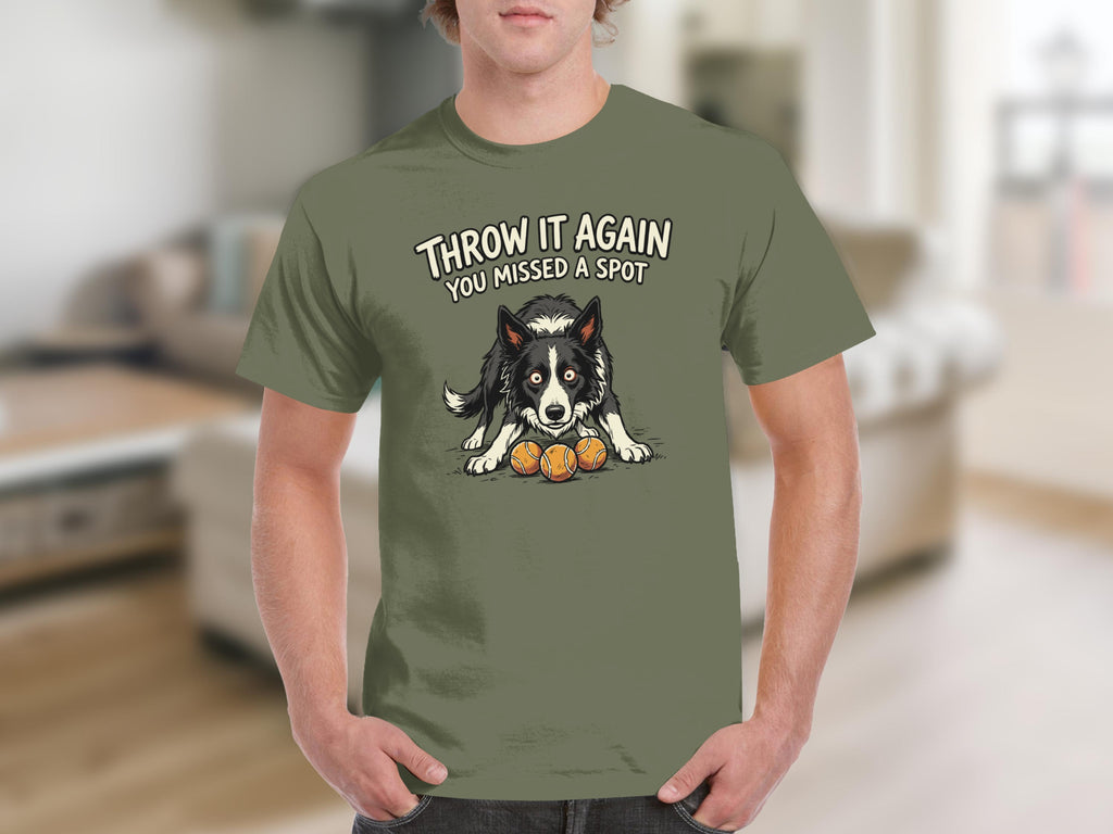 Border collie puppy with tennis balls and text "THROW IT AGAIN YOU MISSED A SPOT".